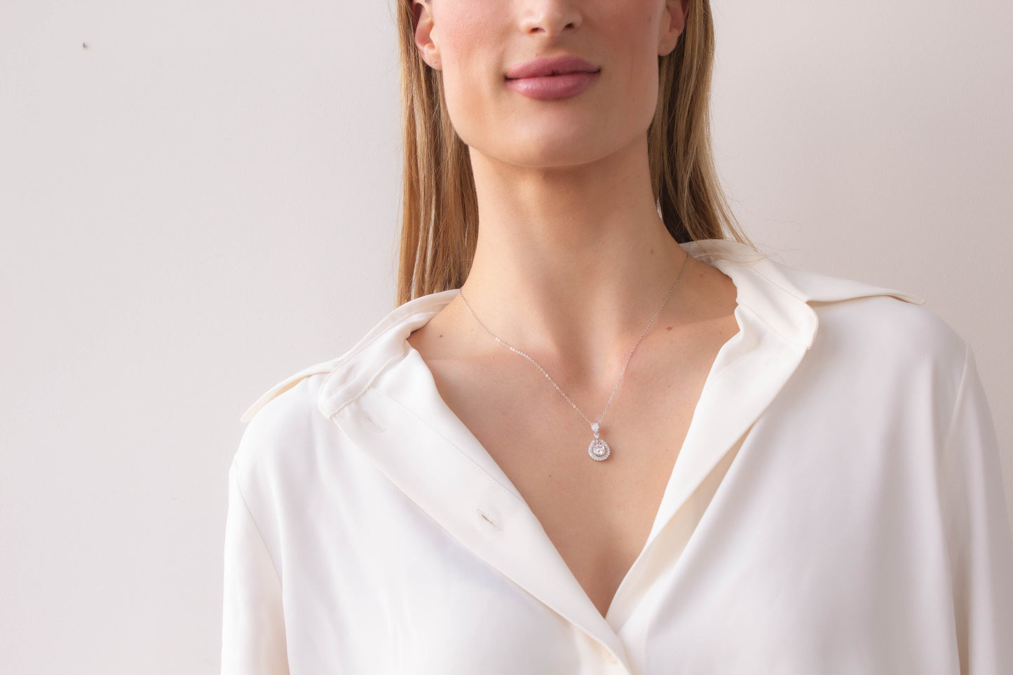 Moissanite Pear Halo