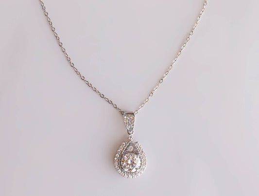 Moissanite Pear Halo